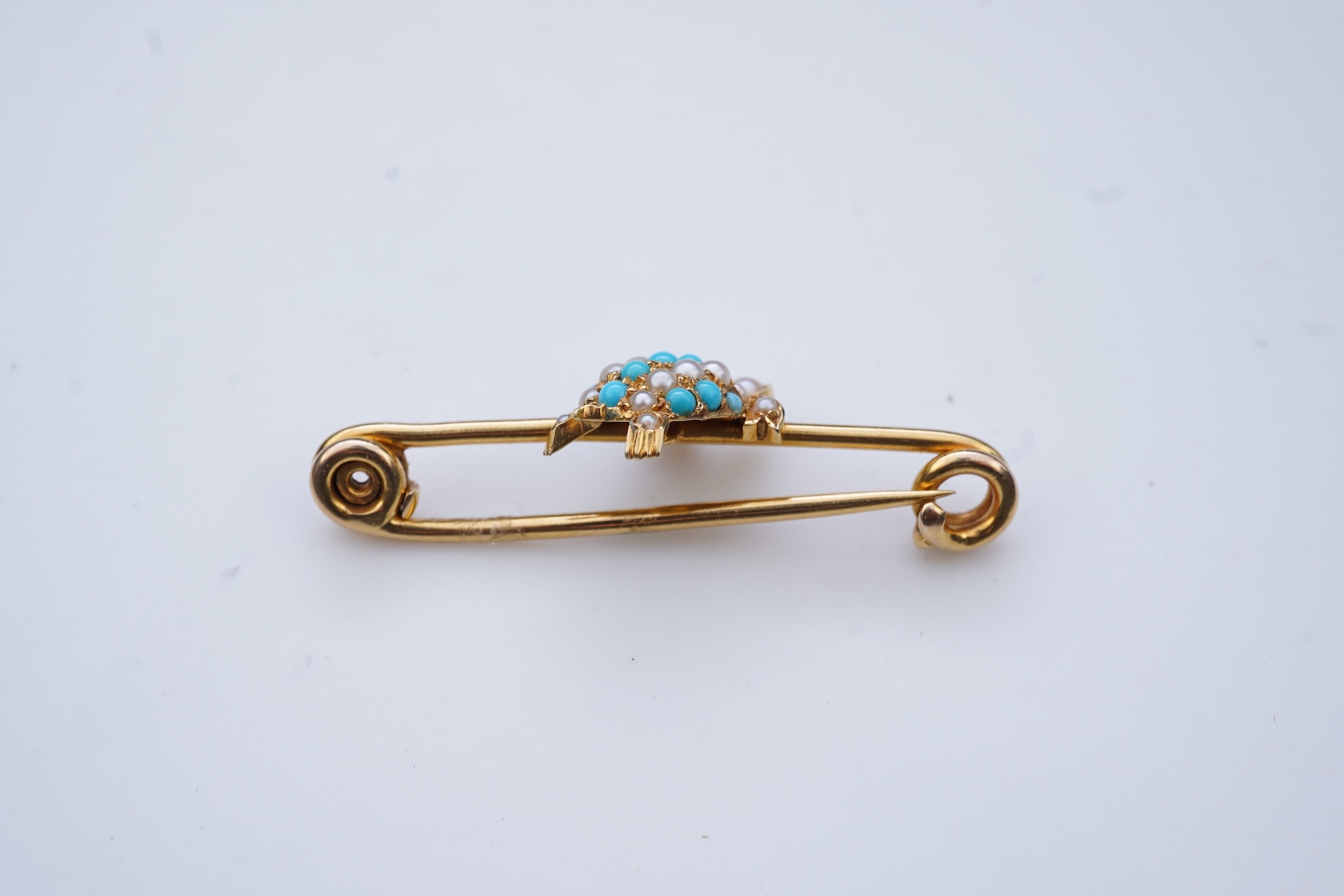 An Edwardian seed pearl and turquoise bar brooch, early 20th century